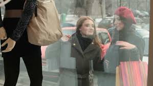 girls looking at window